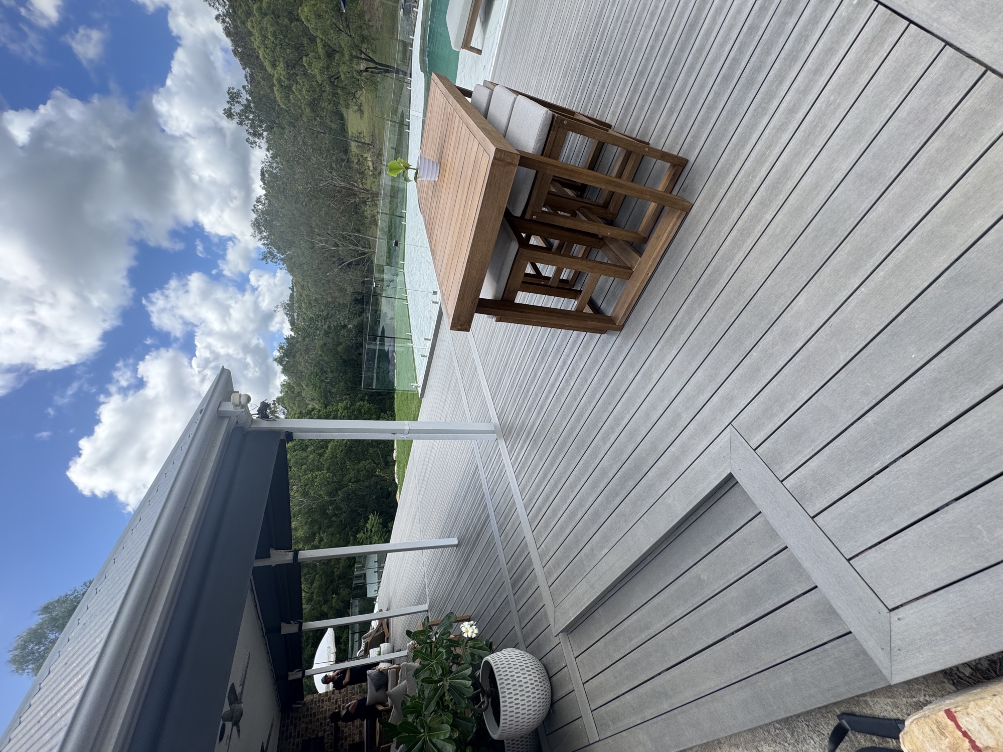 Composite deck with outdoor dining setup