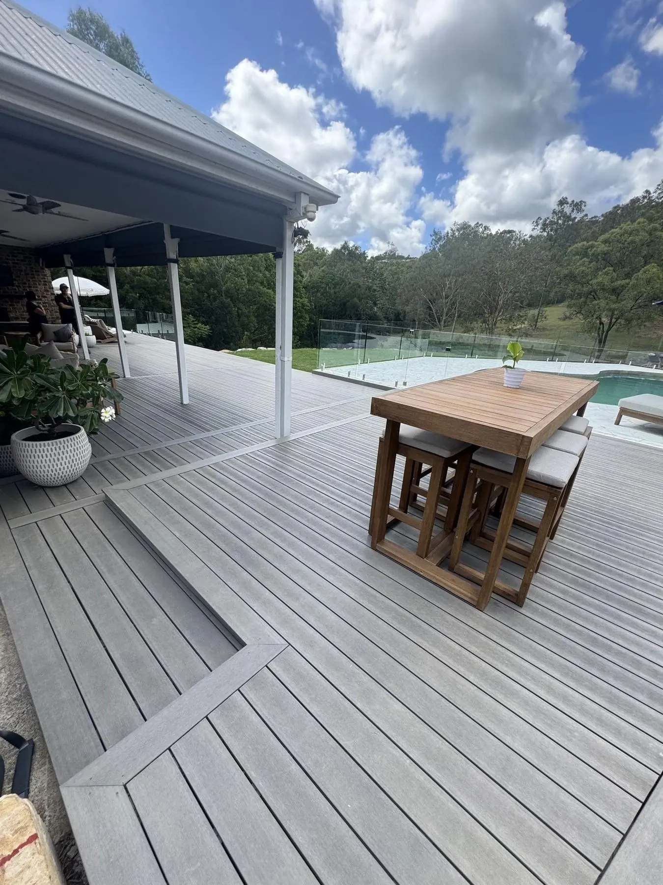 Covered deck with outdoor dining setting