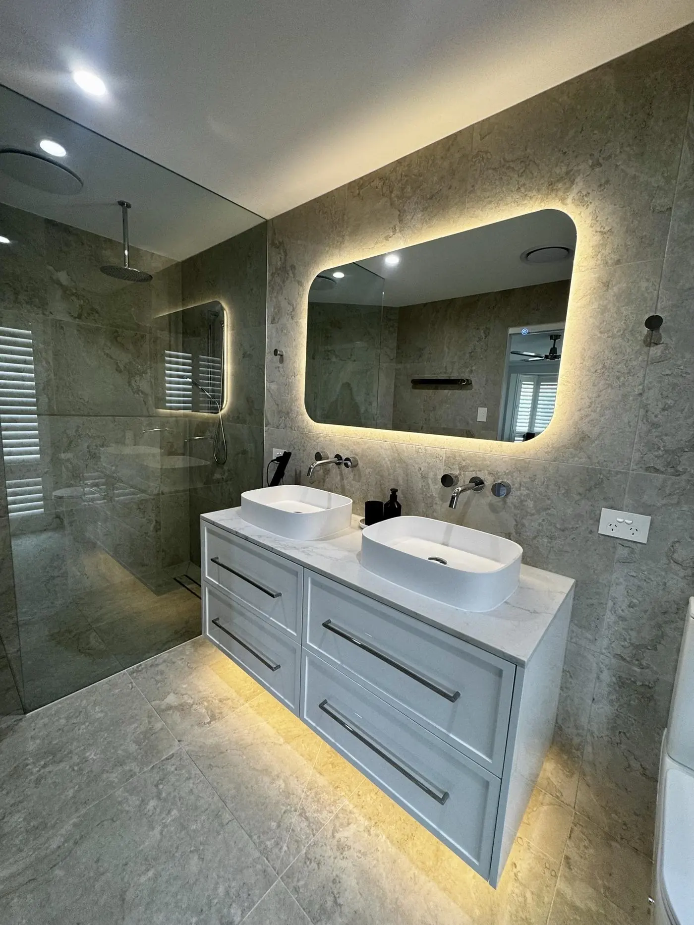 Wellington Point ensuite with double vanity, backlit mirror and walk-in shower